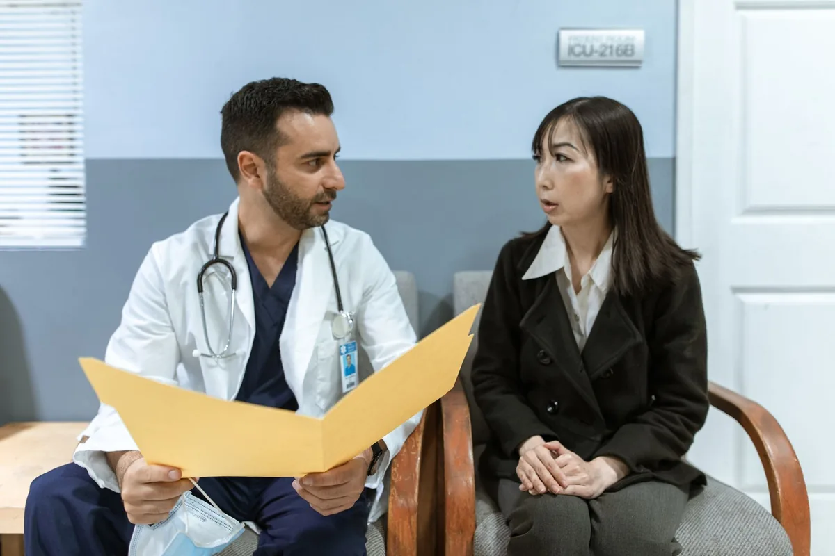 A doctor and patient in conversation